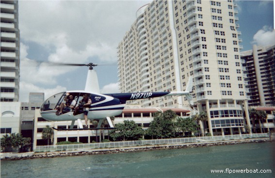 GETTIN' BUZZED
Our FPC chopper R44 piloted by Jonathon Fox, carried Greg Greer(photographer) and Tony Carnaxide (video)as we departed Miami.
