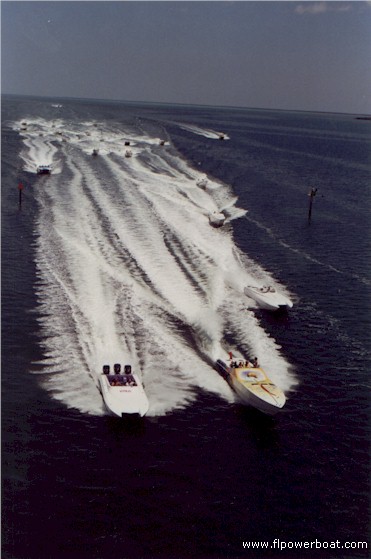 FEATHERBEDS
They're off!  Paceboat Medicine Man; with Howard Miller in the Motion Cat alongside, as the Poker Run fleet approaches Elliott Key.

